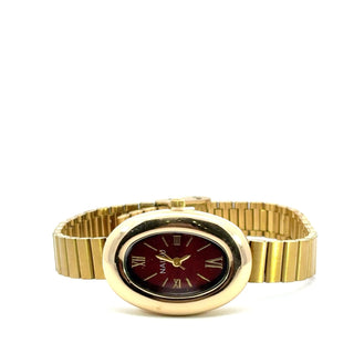 Reloj dorado ovalado con caratula vino naidu SB1901