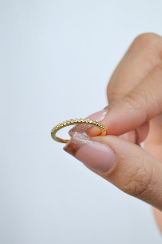 Anillo dorado tipo churumbela con zirconia  RA04017