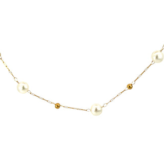 Gargantilla de perlas esfericas de color blanco y dorado SN08011