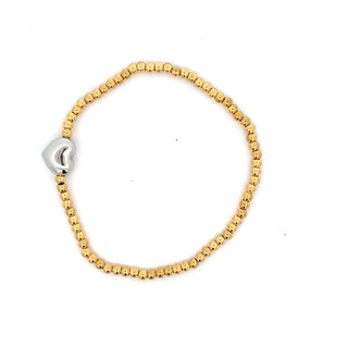 Pulsera elastica bicolor con dije de corazon color plateado estilizado SP1204